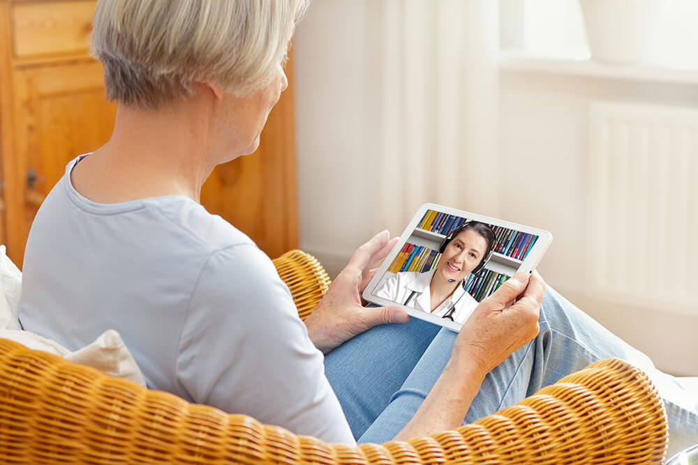 Woman-using-telehealth-technology