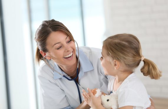 doctor with little girl