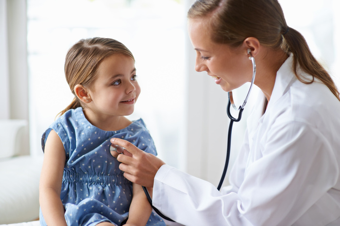 Woman, child and stethoscope of pediatrician for healthcare consulting, check lungs and listening to heartbeat. Medical doctor, girl kid and chest assessment in clinic, hospital